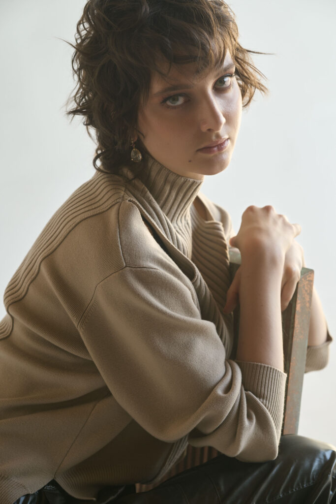Haiden Hicks captured in dramatic studio light, editorial fashion portrait photography